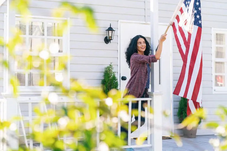 Gwinn's Siding and Windows | Upstate SC | hanging the american flag on the front porch